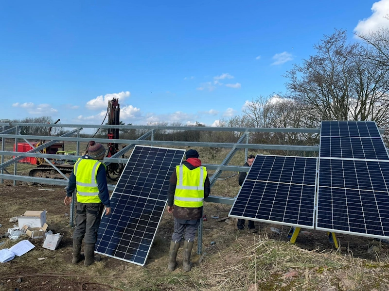 Close up of an farm solar panels being installed